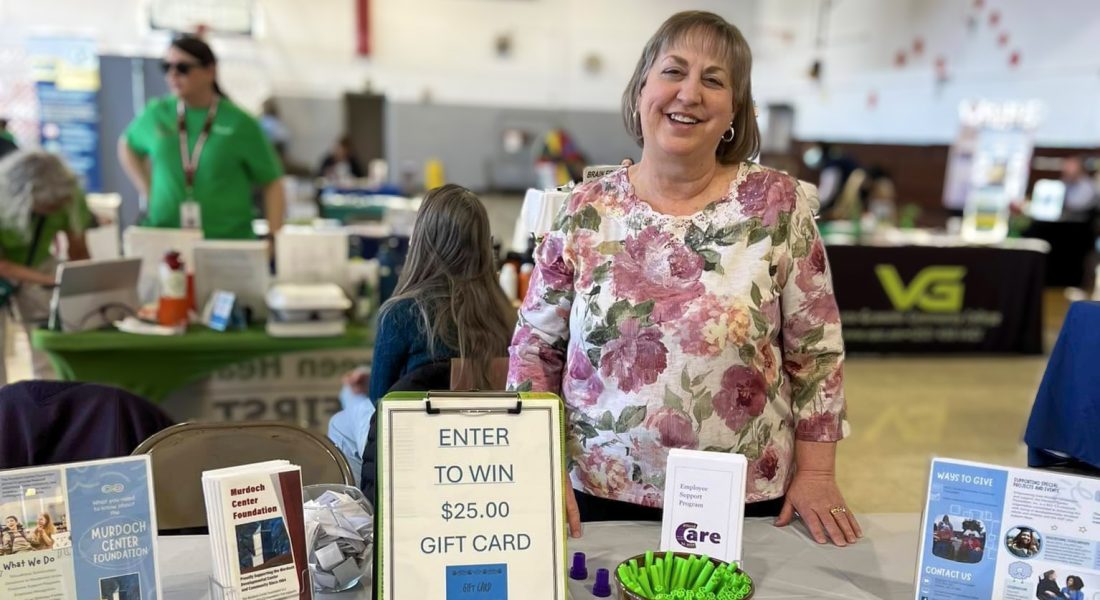 Cathy Brinkman at a Murdoch Center Foundation Booth